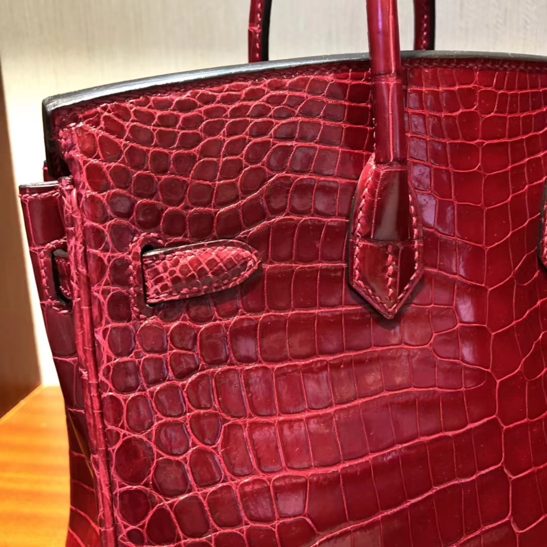 エルメスバッグはいくらですか？エルメスシャイニークロコダイルレザープラチナバッグBirkin25CMゴールドバックル